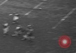 Image of Pro football match New York City USA, 1940, second 17 stock footage video 65675056289