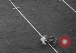 Image of Pro football match New York City USA, 1940, second 21 stock footage video 65675056289