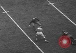 Image of Pro football match New York City USA, 1940, second 23 stock footage video 65675056289