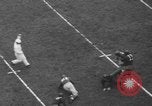 Image of Pro football match New York City USA, 1940, second 26 stock footage video 65675056289