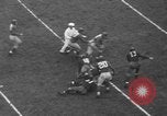 Image of Pro football match New York City USA, 1940, second 30 stock footage video 65675056289