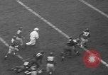 Image of Pro football match New York City USA, 1940, second 31 stock footage video 65675056289