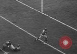 Image of Pro football match New York City USA, 1940, second 32 stock footage video 65675056289