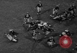 Image of Pro football match New York City USA, 1940, second 62 stock footage video 65675056289
