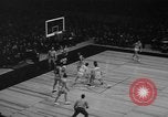 Image of basketball match New York City USA, 1940, second 29 stock footage video 65675056291