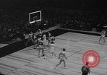 Image of basketball match New York City USA, 1940, second 31 stock footage video 65675056291