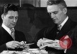Image of bogus money ring Chicago Illinois USA, 1947, second 31 stock footage video 65675056293