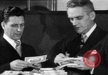 Image of bogus money ring Chicago Illinois USA, 1947, second 32 stock footage video 65675056293