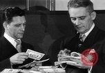 Image of bogus money ring Chicago Illinois USA, 1947, second 34 stock footage video 65675056293