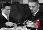 Image of bogus money ring Chicago Illinois USA, 1947, second 35 stock footage video 65675056293