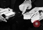 Image of bogus money ring Chicago Illinois USA, 1947, second 39 stock footage video 65675056293