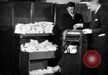 Image of bogus money ring Chicago Illinois USA, 1947, second 42 stock footage video 65675056293
