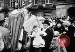 Image of Traditional Christmas parade Amsterdam Netherlands, 1947, second 44 stock footage video 65675056295