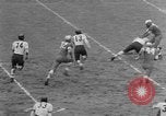 Image ouest versus catholique Bok Vocation Tech football Philadelphia Pennsylvania USA, 1951, de la seconde 8 séquences d'archives historiques vidéo 65675056308
