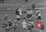 Image ouest versus catholique Bok Vocation Tech football Philadelphia Pennsylvania USA, 1951, de la seconde 13 séquences d'archives historiques vidéo 65675056308