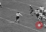 Image ouest versus catholique Bok Vocation Tech football Philadelphia Pennsylvania USA, 1951, de la seconde 15 séquences d'archives historiques vidéo 65675056308