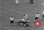 Image ouest versus catholique Bok Vocation Tech football Philadelphia Pennsylvania USA, 1951, de la seconde 16 séquences d'archives historiques vidéo 65675056308