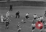 Image ouest versus catholique Bok Vocation Tech football Philadelphia Pennsylvania USA, 1951, de la seconde 20 séquences d'archives historiques vidéo 65675056308