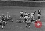 Image ouest versus catholique Bok Vocation Tech football Philadelphia Pennsylvania USA, 1951, de la seconde 23 séquences d'archives historiques vidéo 65675056308