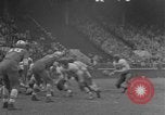 Image ouest versus catholique Bok Vocation Tech football Philadelphia Pennsylvania USA, 1951, de la seconde 29 séquences d'archives historiques vidéo 65675056308