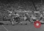Image ouest versus catholique Bok Vocation Tech football Philadelphia Pennsylvania USA, 1951, de la seconde 32 séquences d'archives historiques vidéo 65675056308