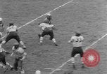 Image ouest versus catholique Bok Vocation Tech football Philadelphia Pennsylvania USA, 1951, de la seconde 36 séquences d'archives historiques vidéo 65675056308