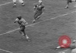 Image ouest versus catholique Bok Vocation Tech football Philadelphia Pennsylvania USA, 1951, de la seconde 54 séquences d'archives historiques vidéo 65675056308