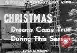 Standbild Kinder träumen von Weihnachten Spielzeug in einem Schaufenster United States USA, 1951, aus Sekunde 4 historischem Filmmaterial Videoclip 65675056310