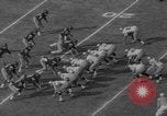 Immagine di USC contro Notre Dame football 1964 Los Angeles California USA, 1964, secondo 16 filmato di repertorio 65675056314
