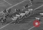 Immagine di USC contro Notre Dame football 1964 Los Angeles California USA, 1964, secondo 27 filmato di repertorio 65675056314