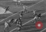 Immagine di USC contro Notre Dame football 1964 Los Angeles California USA, 1964, secondo 30 filmato di repertorio 65675056314