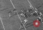 Immagine di USC contro Notre Dame football 1964 Los Angeles California USA, 1964, secondo 38 filmato di repertorio 65675056314