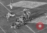 Immagine di USC contro Notre Dame football 1964 Los Angeles California USA, 1964, secondo 48 filmato di repertorio 65675056314