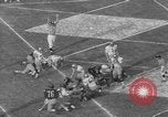 Immagine di USC contro Notre Dame football 1964 Los Angeles California USA, 1964, secondo 49 filmato di repertorio 65675056314