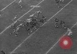 Immagine di USC contro Notre Dame football 1964 Los Angeles California USA, 1964, secondo 60 filmato di repertorio 65675056314