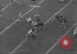 Immagine di USC contro Notre Dame football 1964 Los Angeles California USA, 1964, secondo 61 filmato di repertorio 65675056314