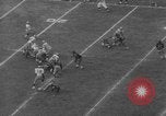 Immagine di USC contro Notre Dame football 1964 Los Angeles California USA, 1964, secondo 62 filmato di repertorio 65675056314