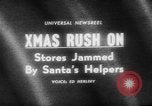 Image of Christmas shopping New York City USA, 1965, second 4 stock footage video 65675056319