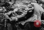 Image of German troops defending against Allies in Normandy France, 1944, second 10 stock footage video 65675056332