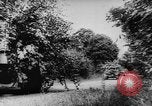 Image of German troops defending against Allies in Normandy France, 1944, second 34 stock footage video 65675056332