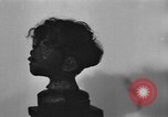 Image of shrunken human head Nuremberg Germany, 1945, second 27 stock footage video 65675056389