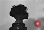 Image of shrunken human head Nuremberg Germany, 1945, second 38 stock footage video 65675056389