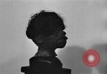 Image of shrunken human head Nuremberg Germany, 1945, second 39 stock footage video 65675056389