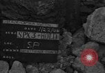 Image of Italian citizens in ruined village Italy, 1944, second 3 stock footage video 65675056390