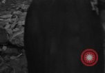 Image of Italian citizens in ruined village Italy, 1944, second 13 stock footage video 65675056390