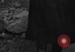 Image of Italian citizens in ruined village Italy, 1944, second 14 stock footage video 65675056390
