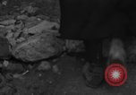 Image of Italian citizens in ruined village Italy, 1944, second 15 stock footage video 65675056390