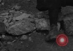 Image of Italian citizens in ruined village Italy, 1944, second 16 stock footage video 65675056390