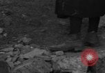 Image of Italian citizens in ruined village Italy, 1944, second 21 stock footage video 65675056390
