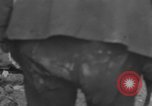 Image of Italian citizens in ruined village Italy, 1944, second 27 stock footage video 65675056390